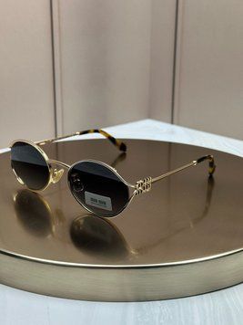 Сонцезахисні окуляри Miu Miu SMU 52Y золоті овальні металеві жіночі
