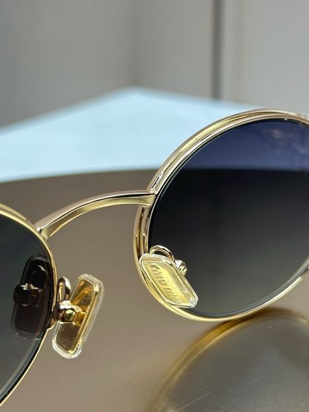 Солнцезащитные очки Miu Miu SMU 52Y золотые овальные металлические с градиентом, серая линза, женские