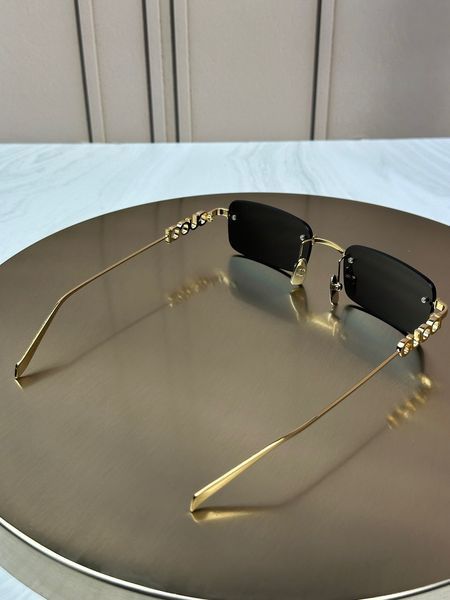 Сонцезахисні окуляри Gucci GG1808 золоті безоправні прямокутні унісекс