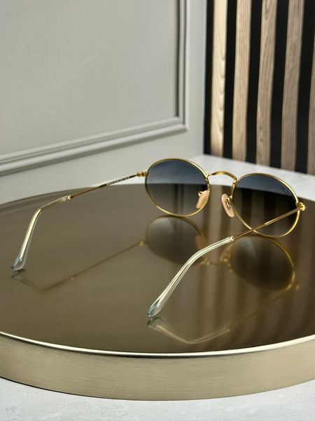 Сонцезахисні окуляри Ray-Ban RB3547 N золото блакитна лінза овальні унісекс