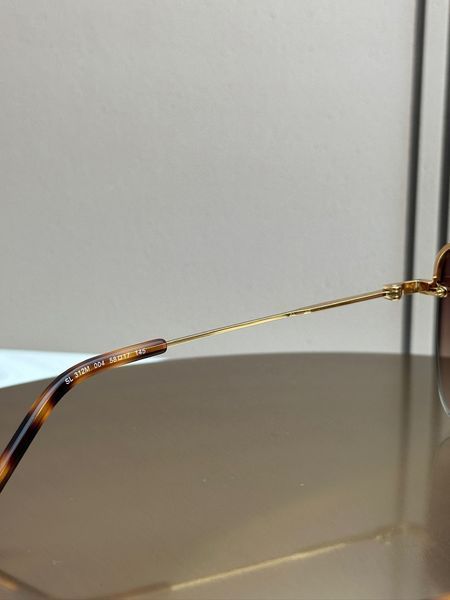 Сонцезахисні окуляри Saint Laurent SL 312M золоті квадратні жіночі
