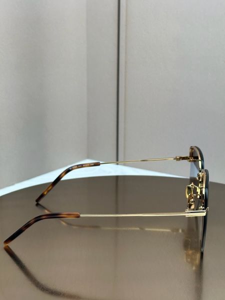 Солнцезащитные очки Saint Laurent SL 312M золотые квадратные безободковые, коричневая линза, черепаховые дужки, женские