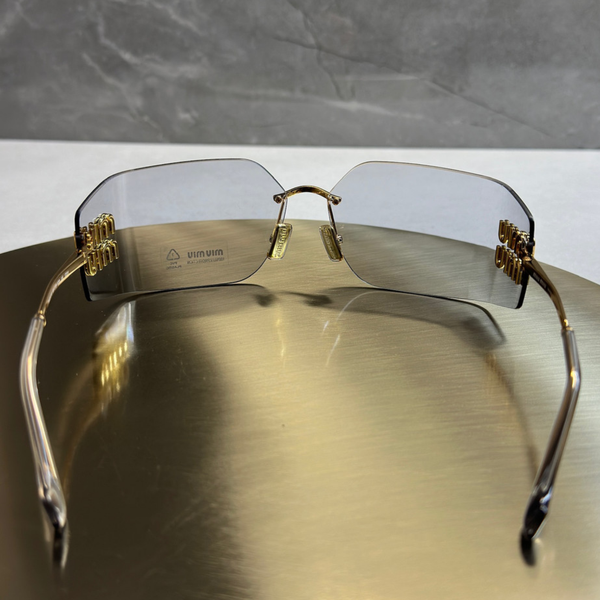 Сонцезахисні окуляри Miu Miu MU54YS Gold/Grey