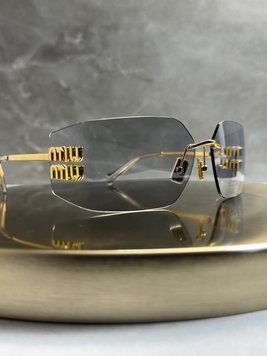 Сонцезахисні окуляри Miu Miu SMU54Y Gold/Light Grey Force143 фото