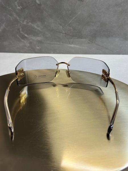 Сонцезахисні окуляри Miu Miu SMU54Y Gold/Light Grey Force143 фото