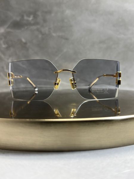Сонцезахисні окуляри Miu Miu SMU54Y Gold/Light Grey Force143 фото