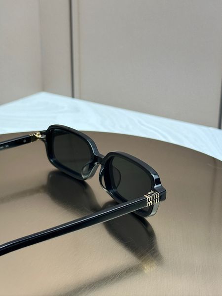 Сонцезахисні окуляри Miu Miu SMU 11ZS чорні прямокутні ацетат жіночі