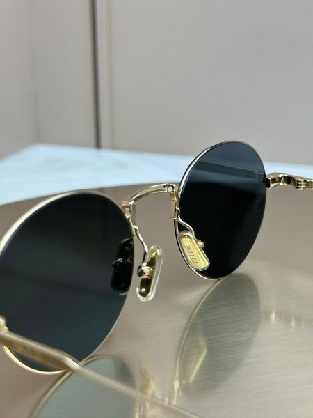 Сонцезахисні окуляри Celine CL40346U золоті круглі металеві темна лінза унісекс