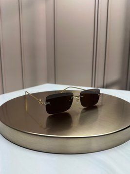 Сонцезахисні окуляри Gucci GG1703S золоті &mdash; безободкова прямокутна оправа, коричнева лінза, логотип GG, унісекс, оригінал GUC07807 фото