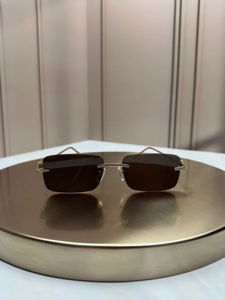 Сонцезахисні окуляри Gucci GG1703S золоті &mdash; безободкова прямокутна оправа, коричнева лінза, логотип GG, унісекс, оригінал GUC07807 фото
