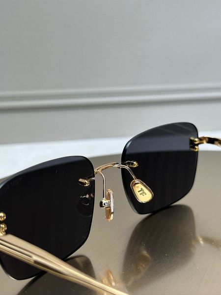 Сонцезахисні окуляри Tom Ford FT1354 золоті безоправні прямокутні унісекс