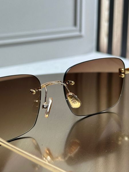 Солнцезащитные очки Tom Ford FT1354 золотые безободковые прямоугольные, коричневая градиент-линза, унисекс