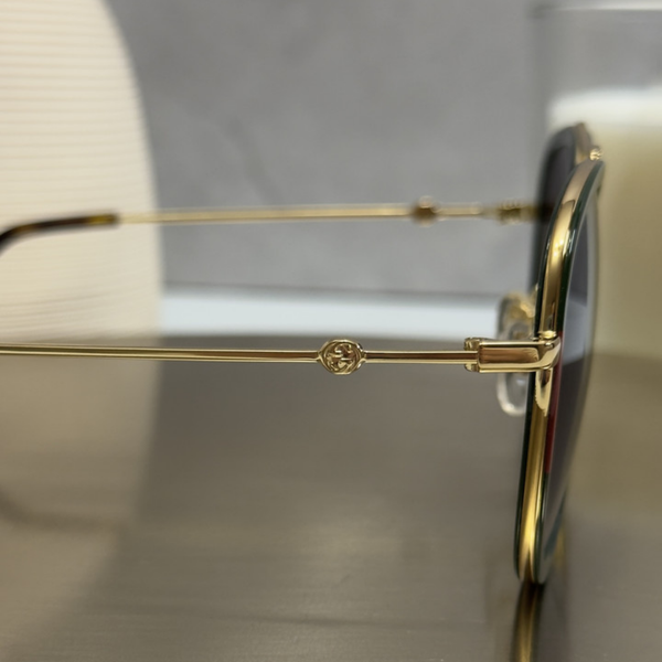 Сонцезахисні окуляри Gucci GG0062S Gold Web/Grey Gradient