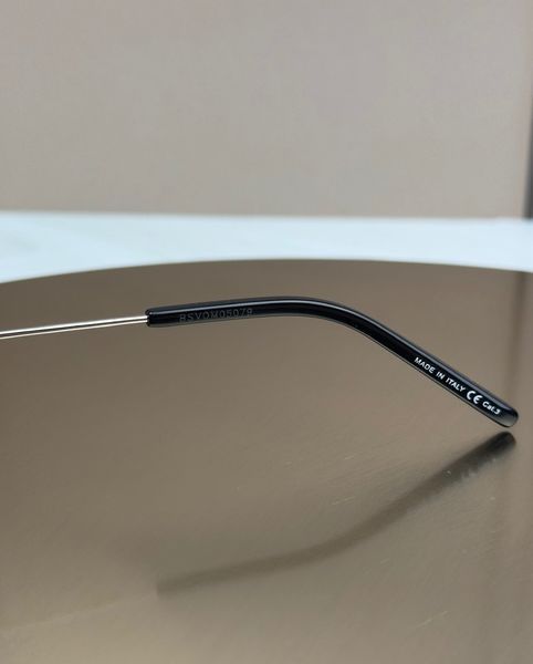 Солнцезащитные очки Saint Laurent SL 302 серебряные ромбовидные металлические геометрические, черная линза, женские