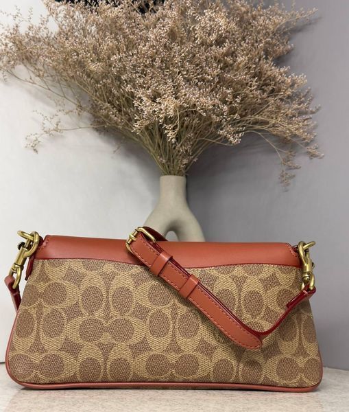 Жіноча сумка Coach Jet Shoulder Bag In Signature Canvas Tan Caramel