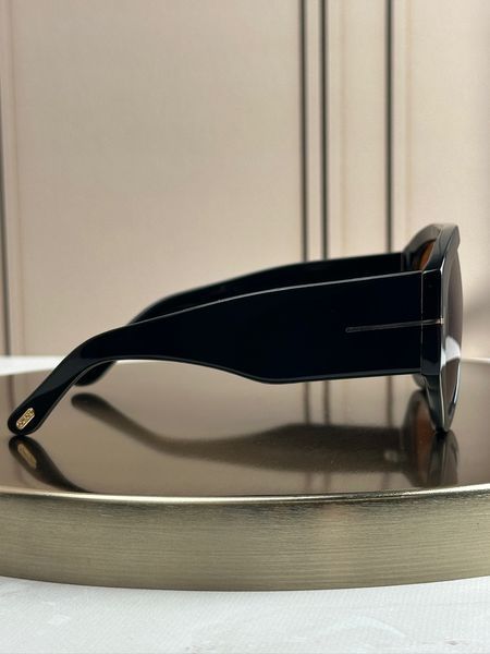 Сонцезахисні окуляри Tom Ford FT1044 чорні оверсайз авіатор бурштинова лінза унісекс