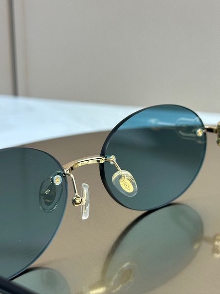 Сонцезахисні окуляри Tiffany & Co TF3104D овальні золоті голуба лінза жіночі