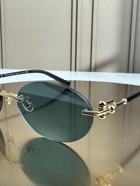 Сонцезахисні окуляри Tiffany & Co TF3104D овальні золоті голуба лінза жіночі
