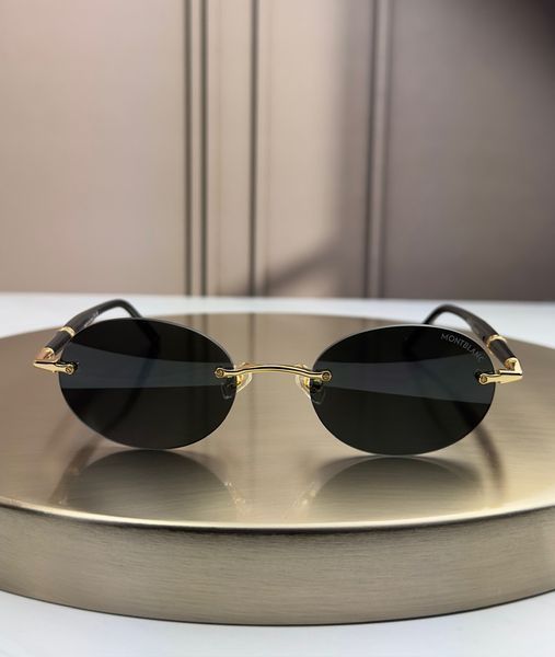 Сонцезахисні окуляри Montblanc MB0415S золото-чорні безоправні овальні чоловічі