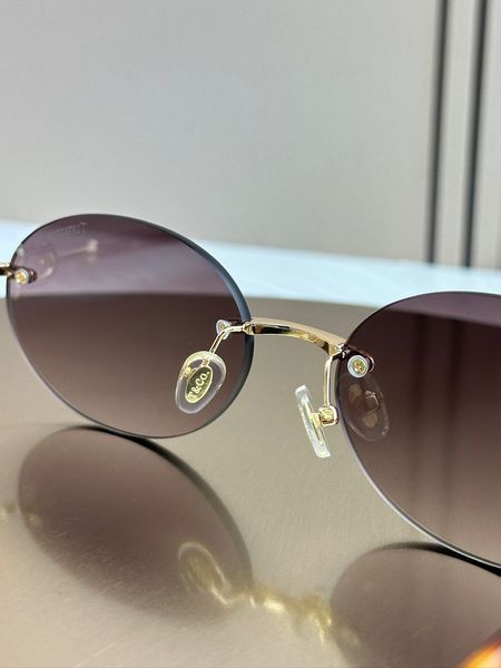 Сонцезахисні окуляри Tiffany & Co TF3104D овальні золоті коричнева лінза жіночі