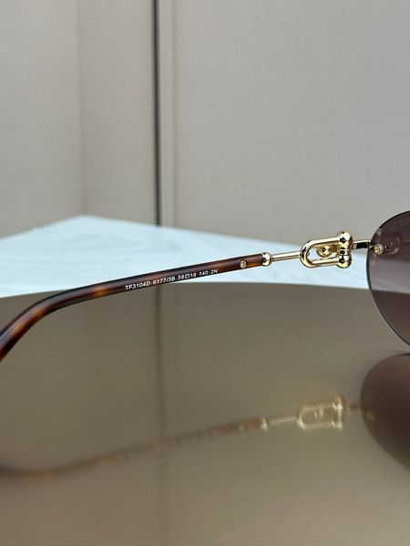 Солнцезащитные очки Tiffany & Co TF3104D бесправные овальные золотые, коричневая линза, черепаховые дужки, женские