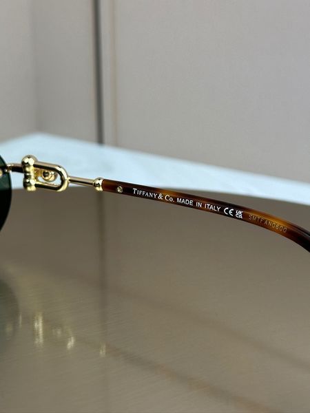 Сонцезахисні окуляри Tiffany & Co TF3104D безоправні овальні золоті жіночі