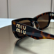 Сонцезахисні окуляри Miu Miu SMU 09WS Havana/Brown &mdash; фото 8