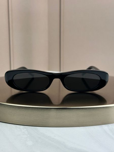 Сонцезахисні окуляри Saint Laurent SL 557 Shade чорні овальні ацетат жіночі