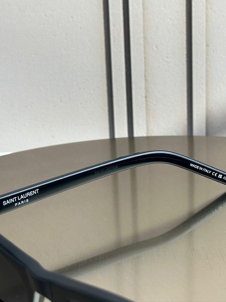 Сонцезахисні окуляри Saint Laurent SL 557 Shade чорні овальні ацетат жіночі