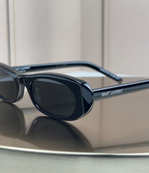 Сонцезахисні окуляри Saint Laurent SL 557 Shade чорні овальні ацетат жіночі