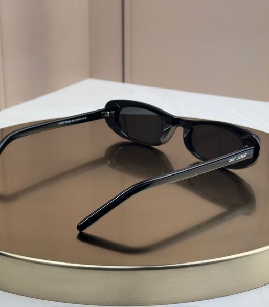 Сонцезахисні окуляри Saint Laurent SL 557 Shade чорні овальні ацетат жіночі