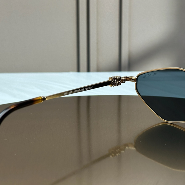 Сонцезахисні окуляри Miu Miu SMU 56Z Gold Havana/Dark Grey
