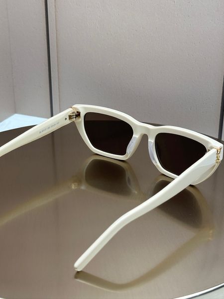 Сонцезахисні окуляри Saint Laurent SL M127 кремові прямокутні ацетатні з логотипом YSL, коричнева лінза, жіночі, оригінал SLT53077 фото