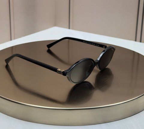 Сонцезахисні окуляри Miu Miu SMU 04Z чорні овальні ацетат жіночі