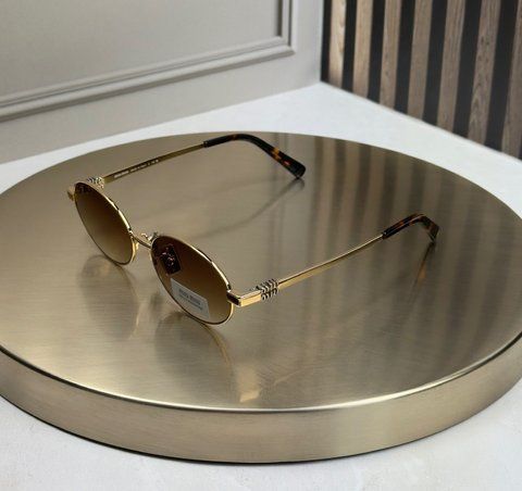 Солнцезащитные очки Miu Miu MU 50ZV золотые овальные металлические с градиентом, коричневая линза, женские