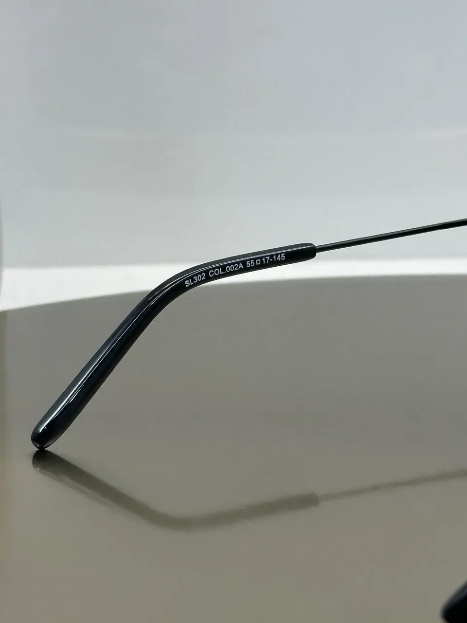 Гравировка на дужке оригинальных металлических Saint Laurent SL 302