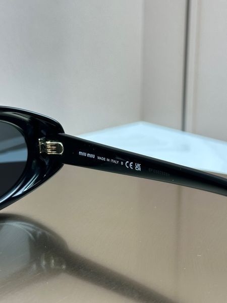 Сонцезахисні окуляри Miu Miu SMU B09 чорні овальні ацетат жіночі