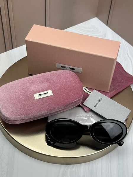 Сонцезахисні окуляри Miu Miu SMU B09 чорні овальні ацетат жіночі