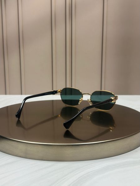 Сонцезахисні окуляри Gucci GG1593S золоті геометричні зелена лінза унісекс