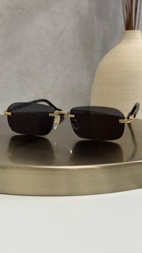 Сонцезахисні окуляри Gucci GG1221S безоправні золото-чорні прямокутні унісекс