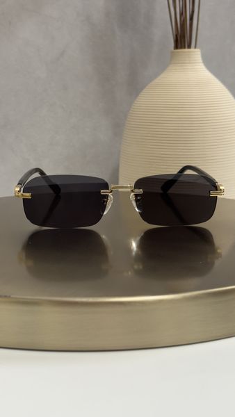 Сонцезахисні окуляри Gucci GG1221S безоправні золото-чорні прямокутні унісекс