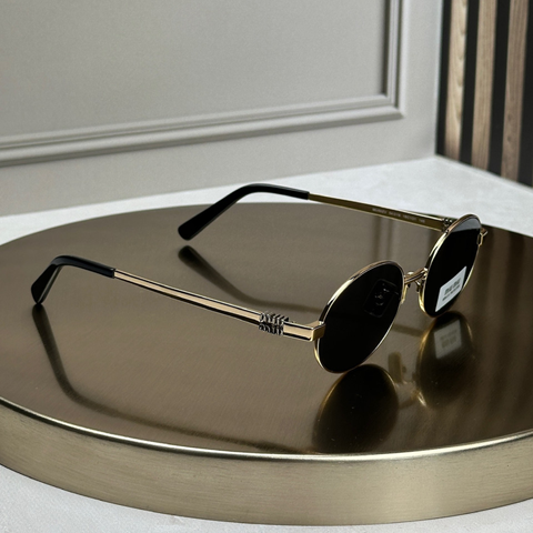 Сонцезахисні окуляри Miu Miu MU 50ZV Gold/Dark Grey