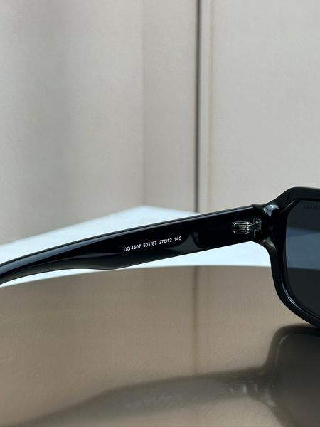 Сонцезахисні окуляри Dolce & Gabbana DG4507 чорні прямокутні темна лінза унісекс