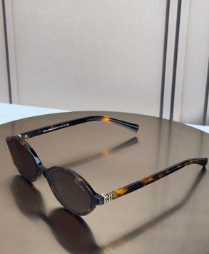 Сонцезахисні окуляри Miu Miu SMU 04Z черепахові овальні ацетат жіночі