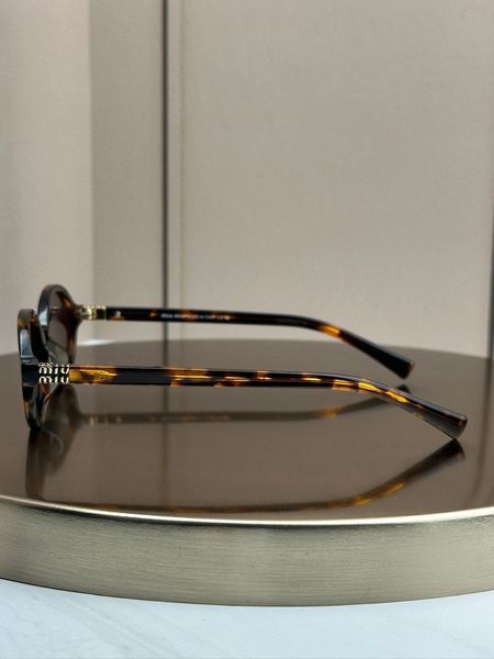 Сонцезахисні окуляри Miu Miu SMU 04Z черепахові овальні ацетат жіночі