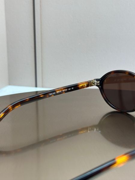 Сонцезахисні окуляри Miu Miu SMU 04Z черепахові овальні ацетат жіночі