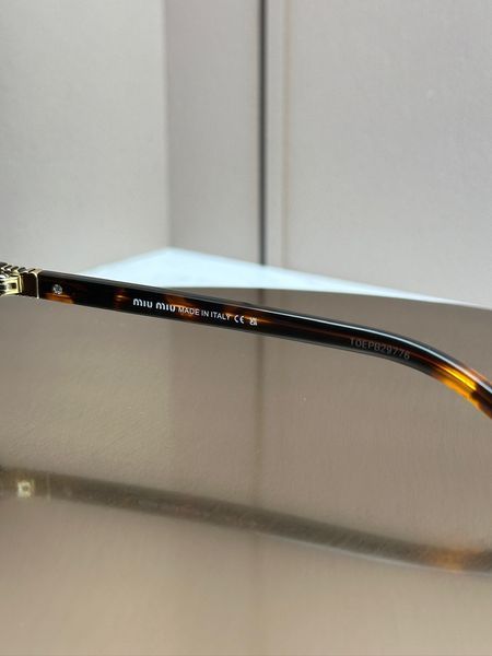 Сонцезахисні окуляри Miu Miu SMU 04Z черепахові овальні ацетат жіночі