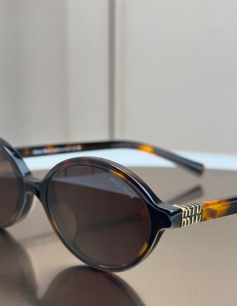 Сонцезахисні окуляри Miu Miu SMU 04Z черепахові овальні ацетат жіночі