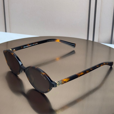 Сонцезахисні окуляри Miu Miu SMU 04Z Havana/Brown