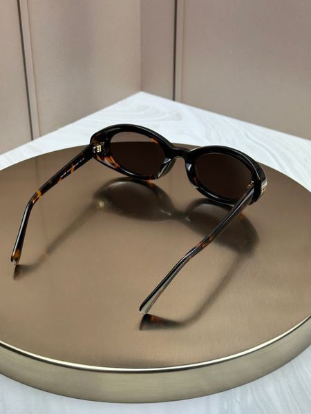 Сонцезахисні окуляри Miu Miu SMU B09 черепахові овальні ацетат жіночі